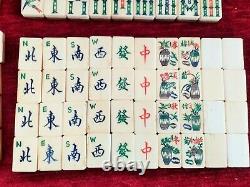 A vintage Mah jong set Bovine & Bamboo 148 tiles in deep slide top box c1920's