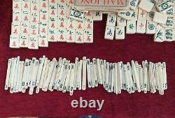 A vintage Mah jong set Bovine & Bamboo 148 tiles in deep slide top box c1920's